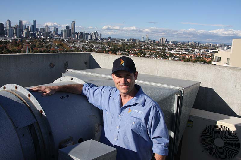 Wayne installing a rooftop packaged unitRooftop